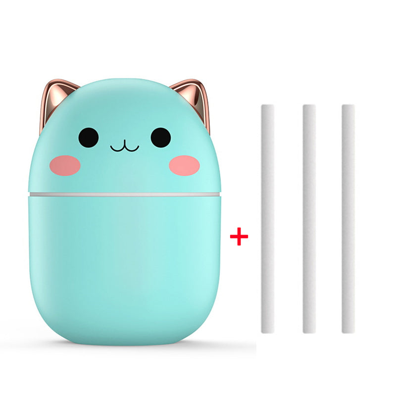 Cute turquoise cat-shaped container with rose gold accents and two white straws on a white background