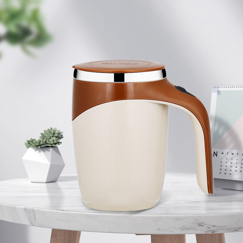 White mug with brown handle and lid on a marble surface